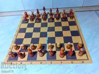 Russian wooden chess with handmade matryoshka pieces