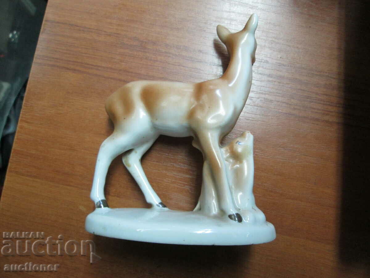 AN OLD PORCELAIN FIGURE OF A DOE WITH HER LITTLE with price 25.00 BGN | € 12.78