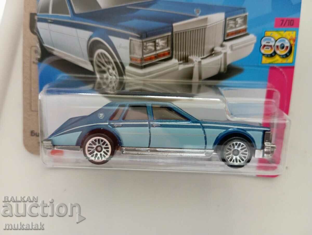 Auction HOT WHEELS 82 CADILLAC SEVILLE MODEL STROLLER TOY Auction HOT WHEELS 82 CADILLAC SEVILLE MODEL STROLLER TOY