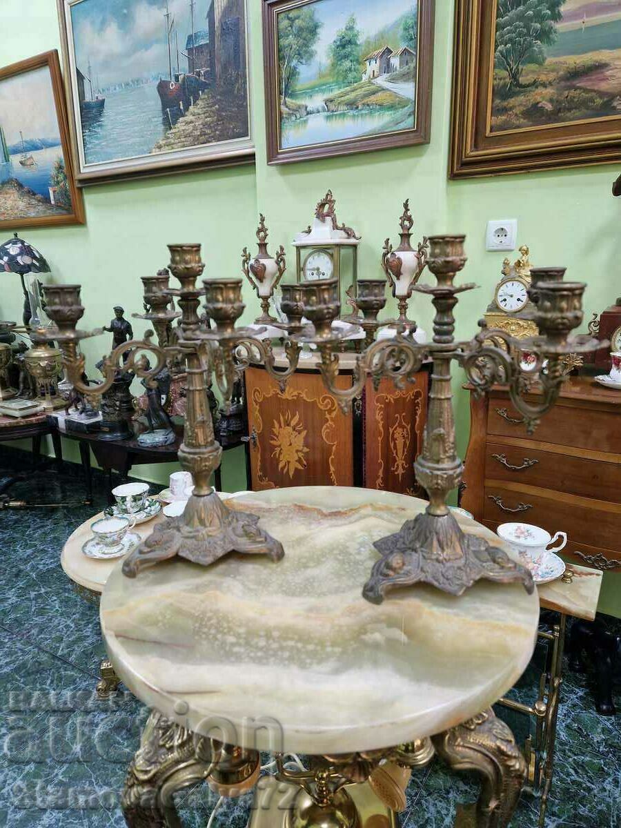 A pair of beautiful antique French bronze candlesticks A pair of beautiful antique French bronze candlesticks