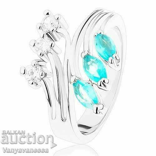 Ring with branched shoulders, zircons - clear and with aquamarine