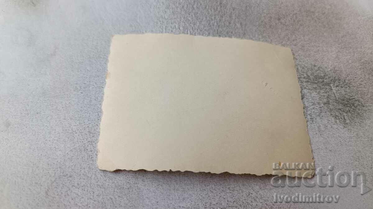 Photo Sofia Young men and women in front of the National Library with price 1.65 BGN | € 0.84