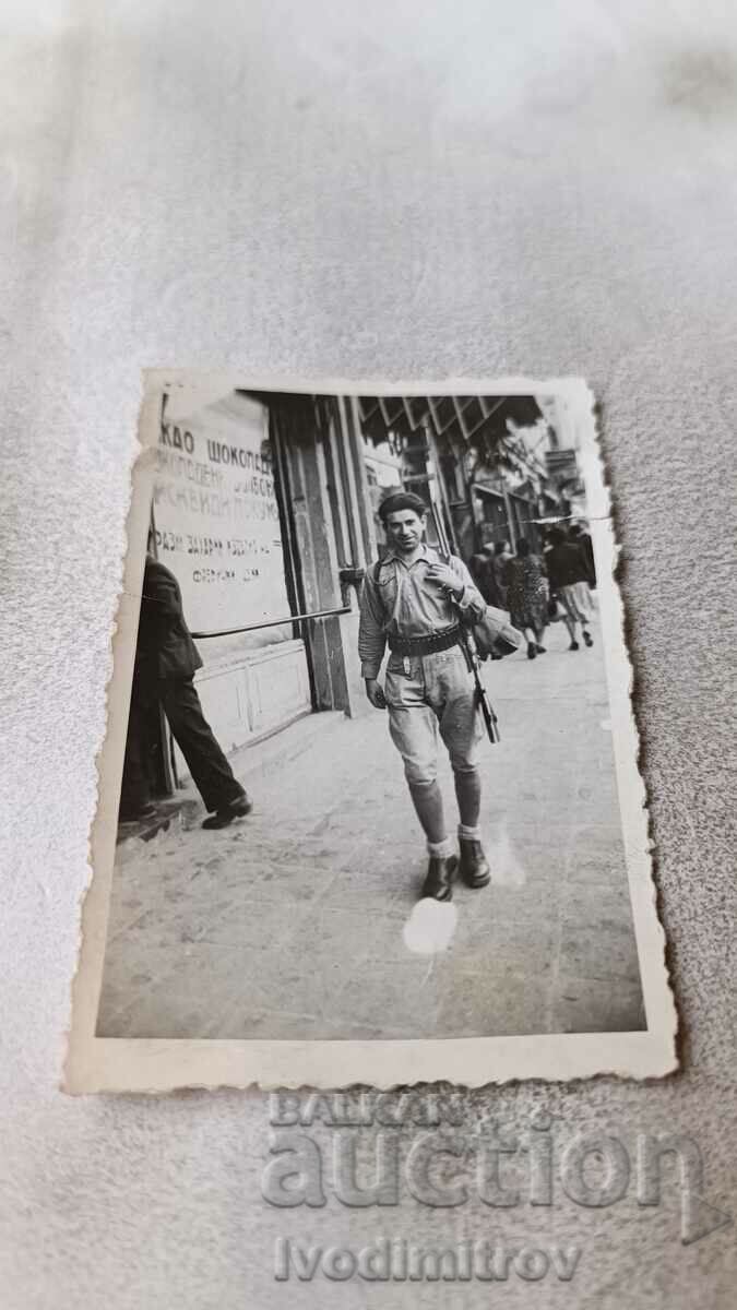 Photo Sofia Lovdzhia with a hunting rifle on a walk