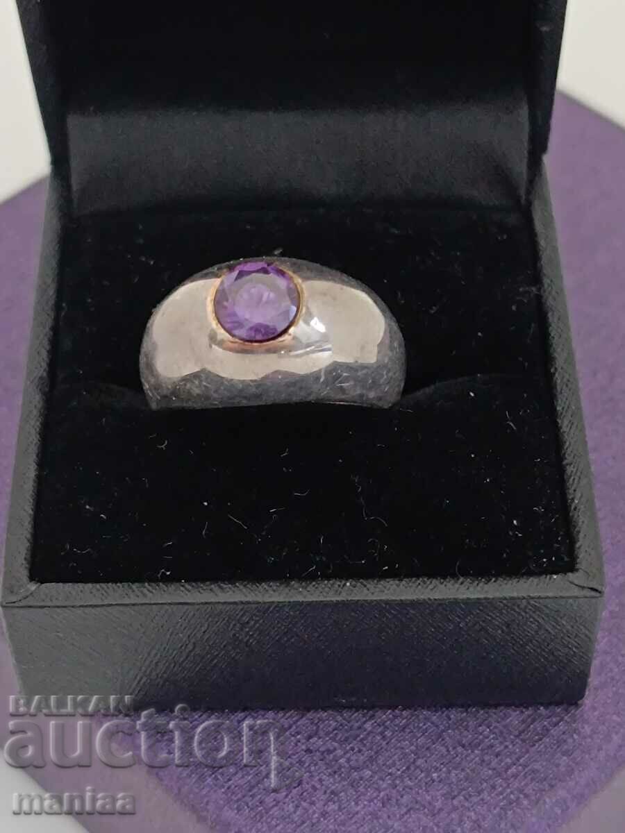 A beautiful silver ring marked with a natural stone #DZ