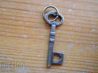 old bronze locket - key