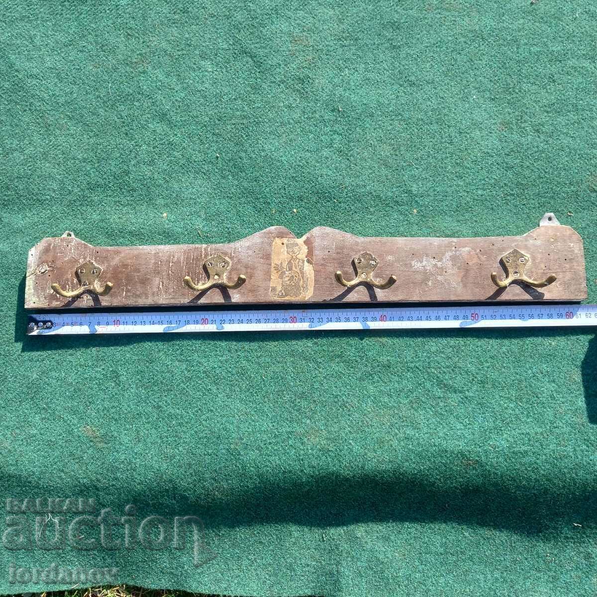 Auction  Old wooden hanger.