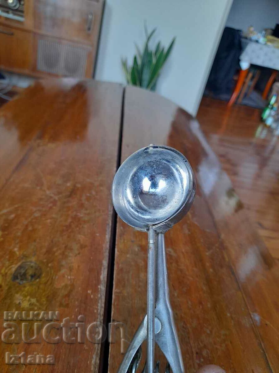 Delivery of Old spoon, ice cream scoop Delivery of Old spoon, ice cream scoop