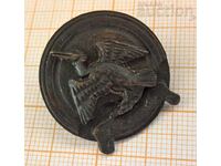 Solid copper badge