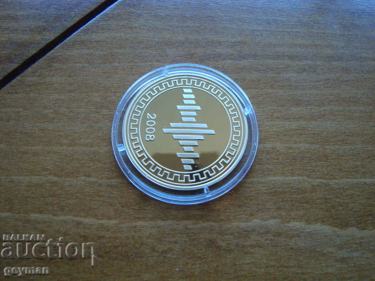 Auction Gilded plaque "M - wire" - 2008 Auction Gilded plaque "M - wire" - 2008