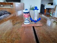 Old souvenir sailor thermometer