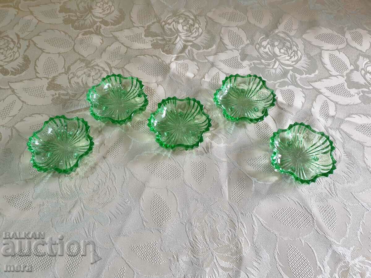 Sweet plates made of thick colored glass on legs with price 28.00 BGN | € 14.32 Sweet plates made of thick colored glass on legs with price 28.00 BGN | € 14.32