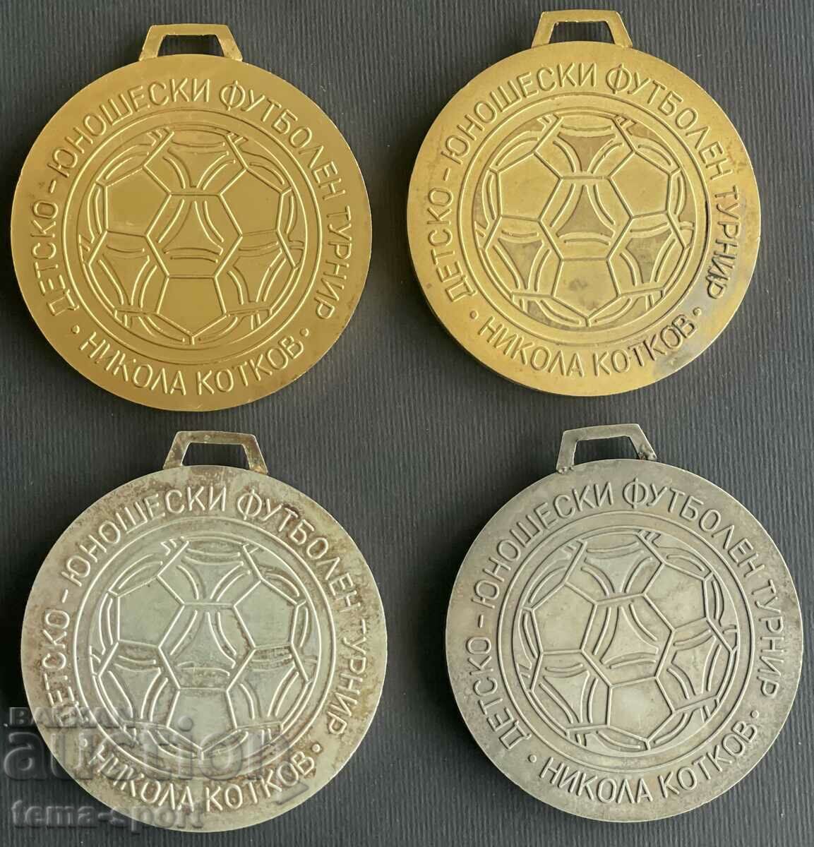 64 Bulgaria 4 medals football tournament Nikola Kotkov with price 50.00 BGN | € 25.56 64 Bulgaria 4 medals football tournament Nikola Kotkov with price 50.00 BGN | € 25.56