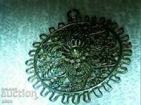 Filigree medallion silver