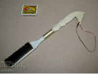 Clothes brush with rotating plastic handle Horse head
