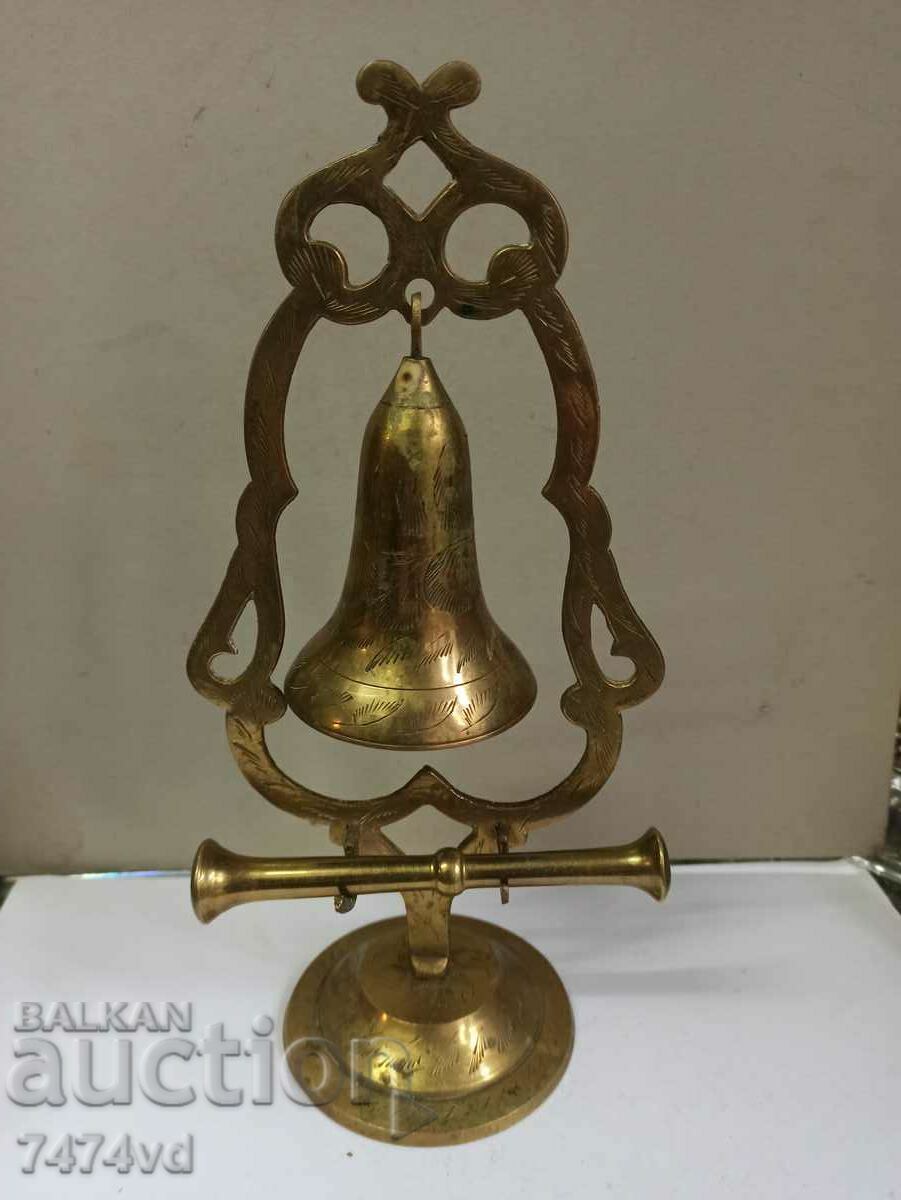 BRONZE BELL ON A STAND WITH ORNAMENTS