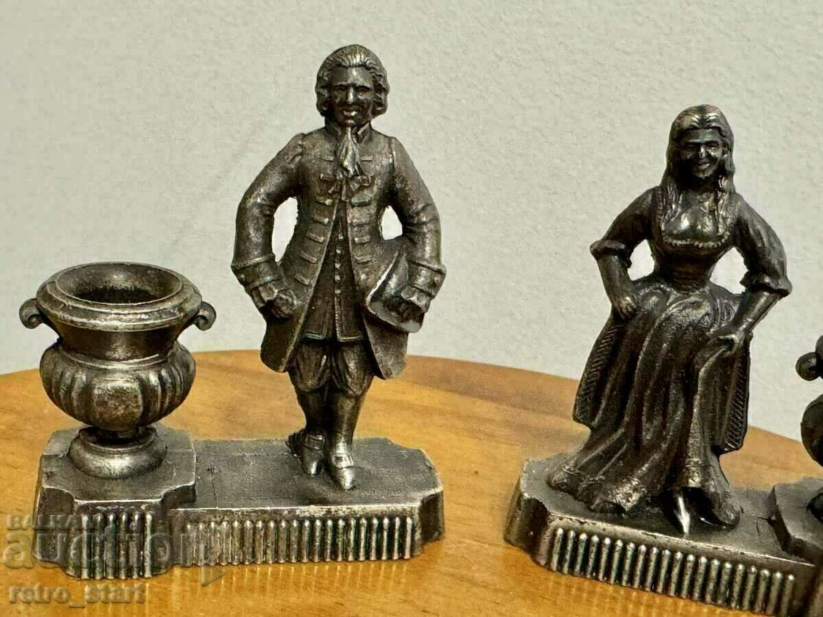Auction Small figural candlesticks, metal Auction Small figural candlesticks, metal