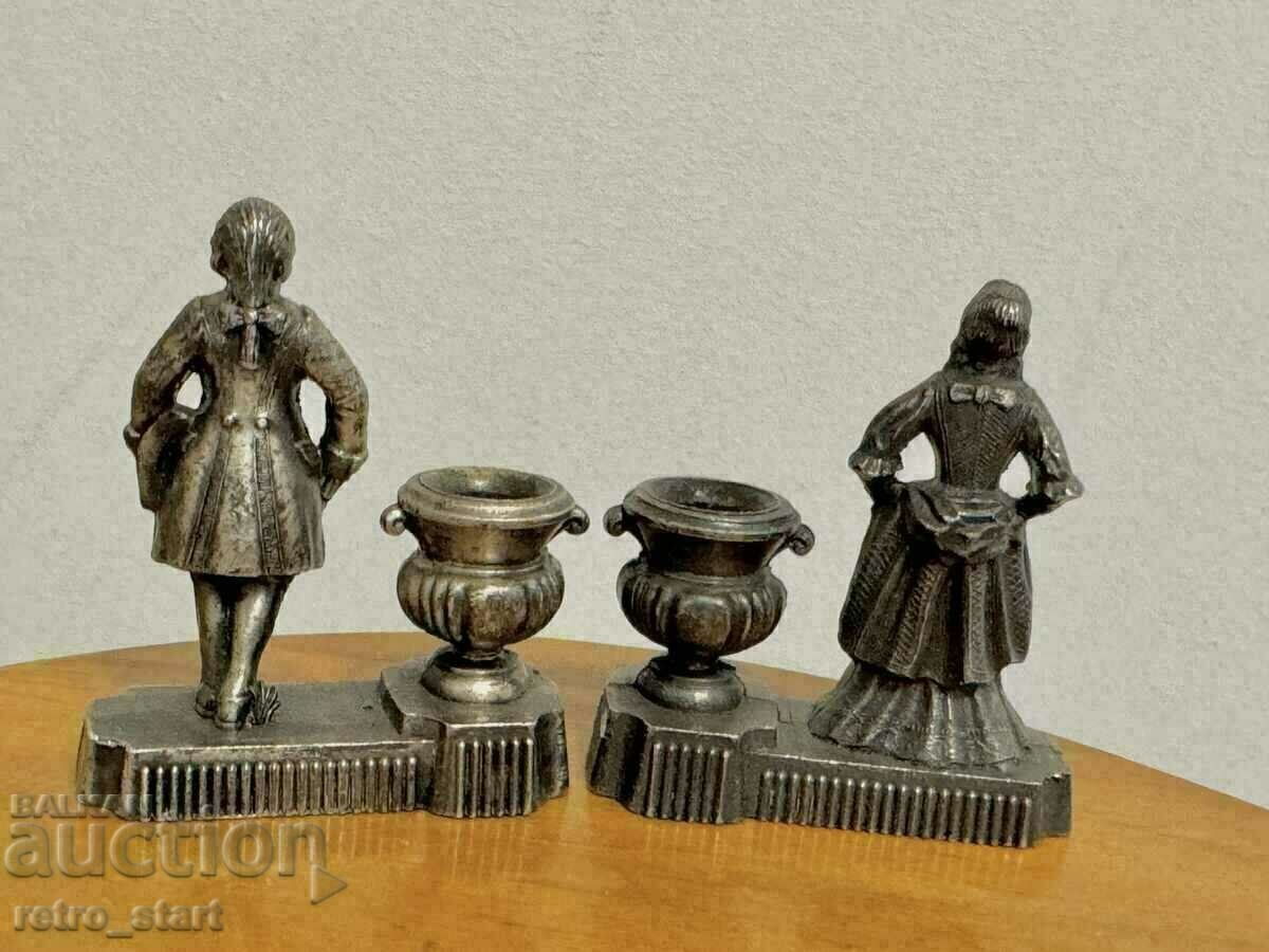 Delivery of Small figural candlesticks, metal Delivery of Small figural candlesticks, metal