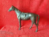 Old metal bronze brass figure of a Saddled horse