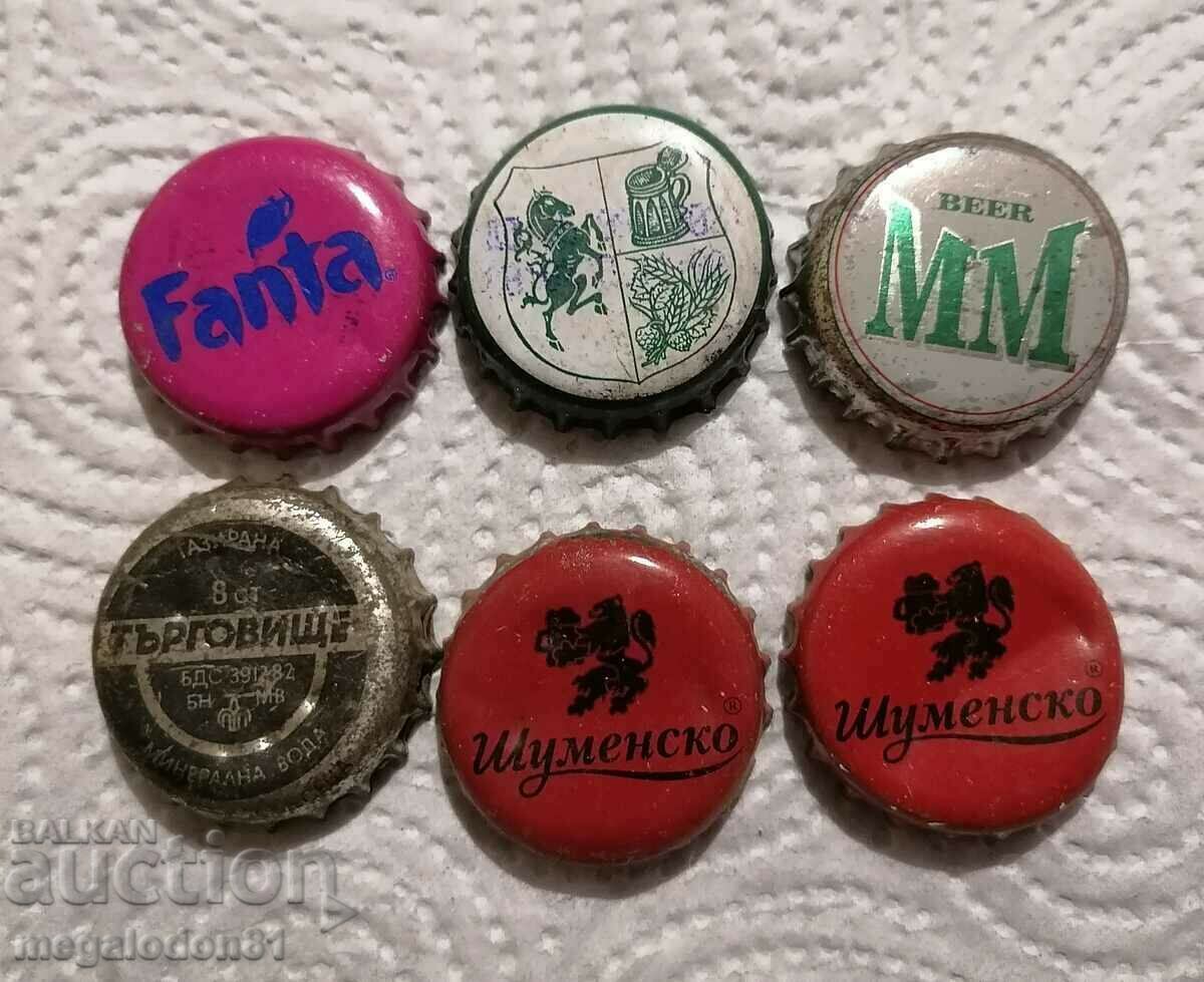 Old beer caps and soft drinks