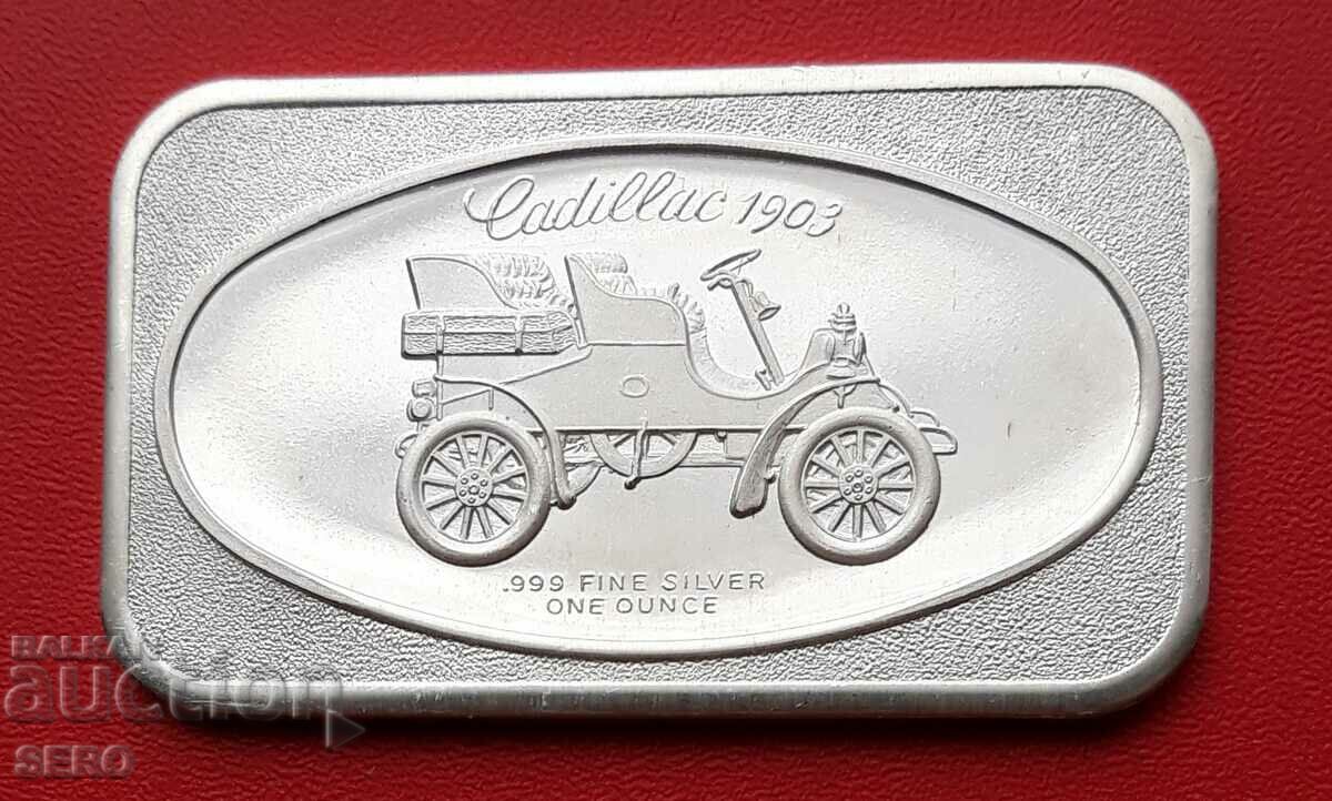Mașină Cadillac cu uncie de argint din 1903