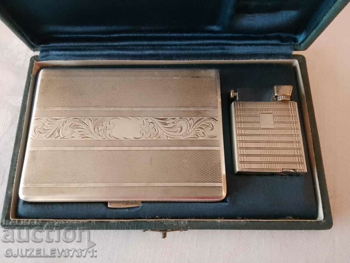 Rare collectible silver snuff and lighter set.