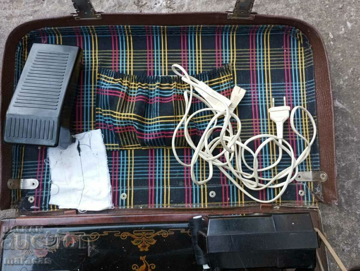Auction Old sewing machine with electric drive Auction Old sewing machine with electric drive