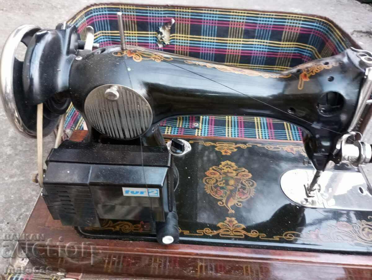 Delivery of Old sewing machine with electric drive