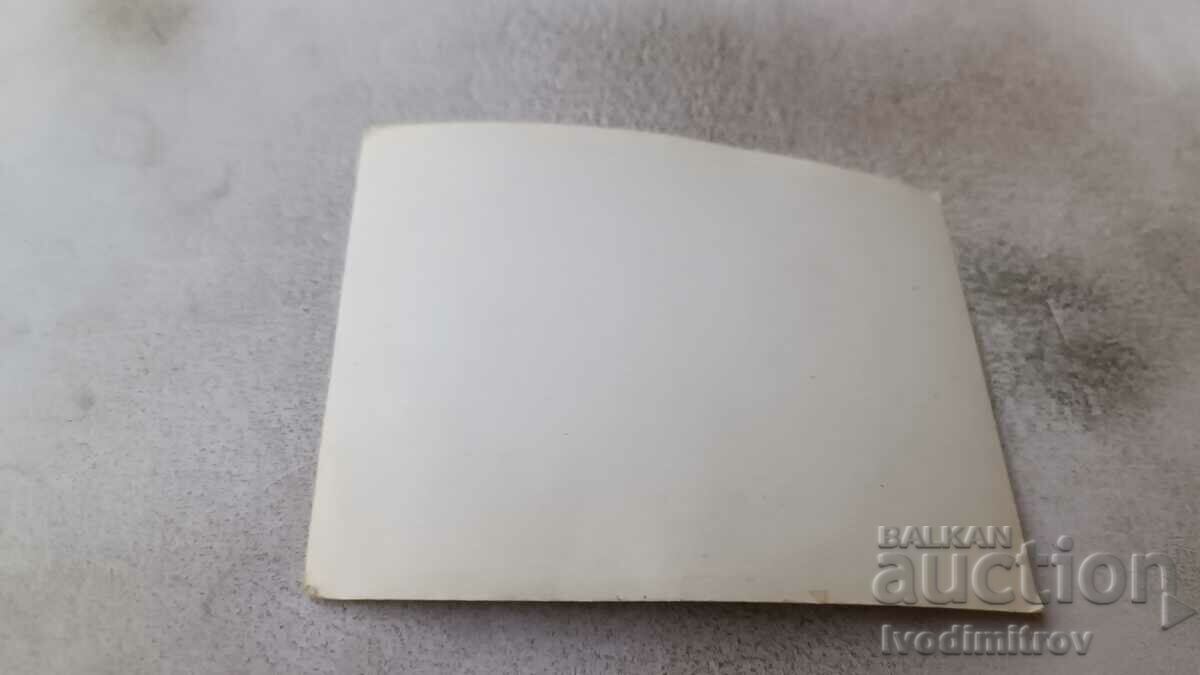 Photo A woman and a man in shorts on a balcony with price 1.45 BGN | € 0.74 Photo A woman and a man in shorts on a balcony with price 1.45 BGN | € 0.74