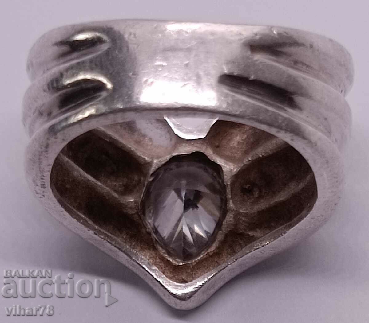 A silver ring with a gold bracelet around the stone - 7 A silver ring with a gold bracelet around the stone - 7