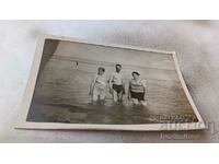 Photo Varna Two women and a man on the beach