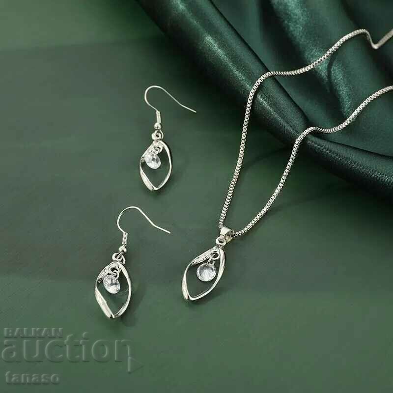 Auction Necklace and earrings set with zircons Auction Necklace and earrings set with zircons