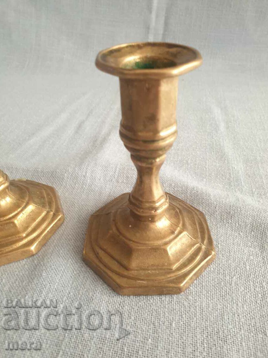 A pair of bronze candlesticks with price 30.00 BGN | € 15.34 A pair of bronze candlesticks with price 30.00 BGN | € 15.34