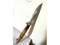 Beautiful thick steel knife with brass and dog