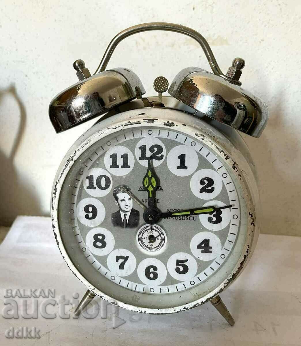 A beautiful white old clock with bells