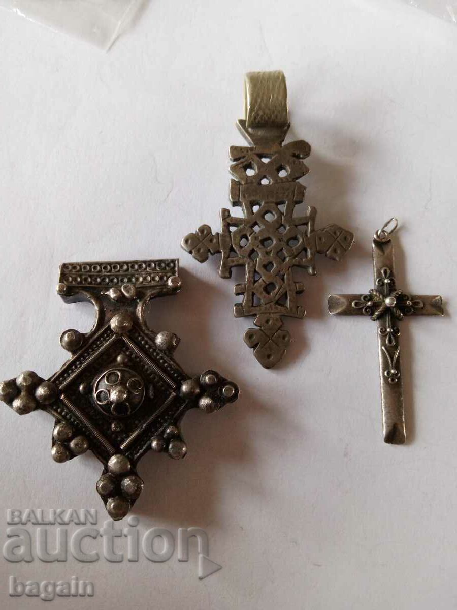 Lot of unique silver crosses.