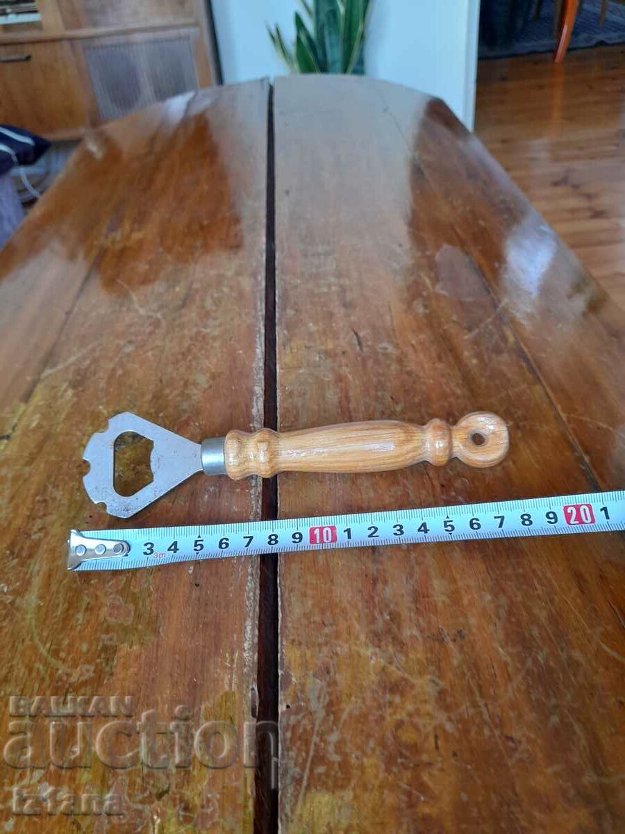 An old bottle opener with price 6.00 BGN | € 3.07