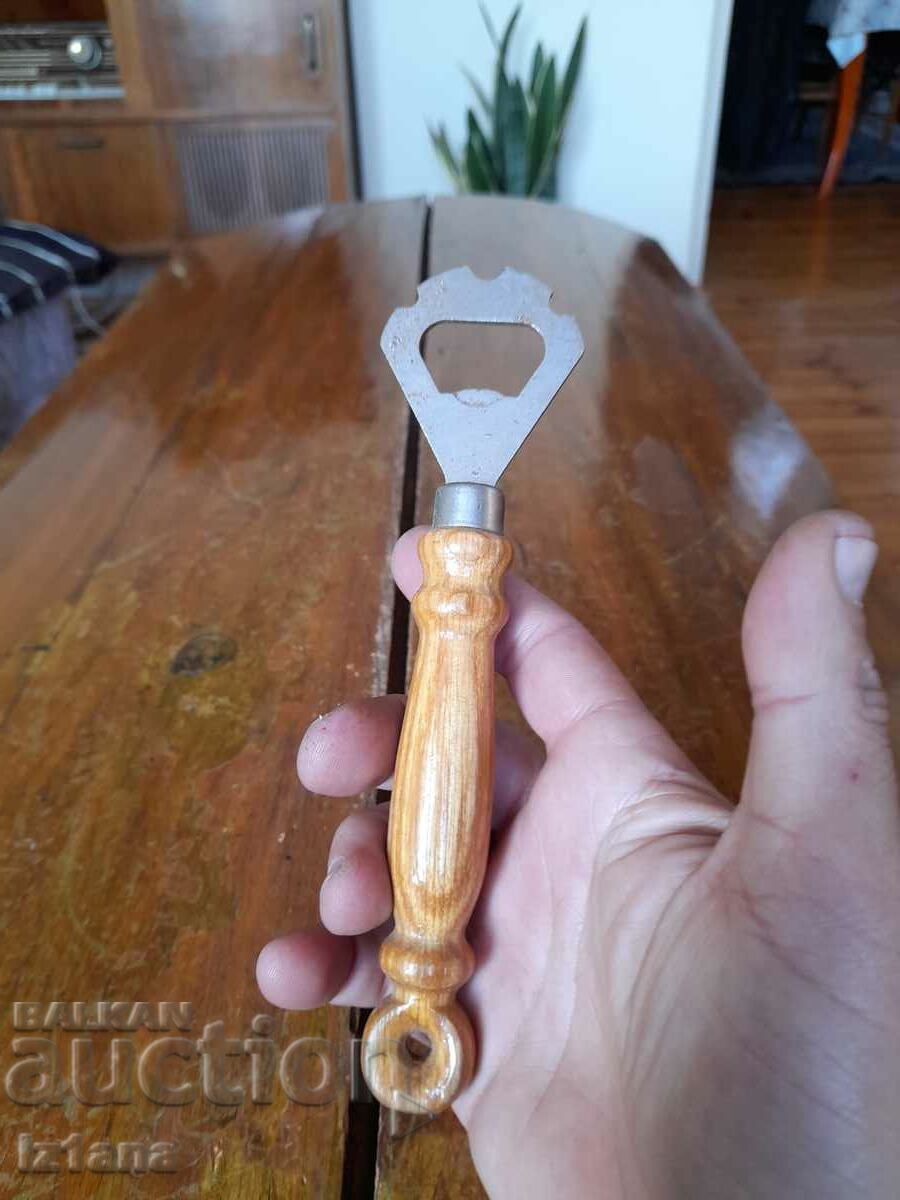 Auction  An old bottle opener