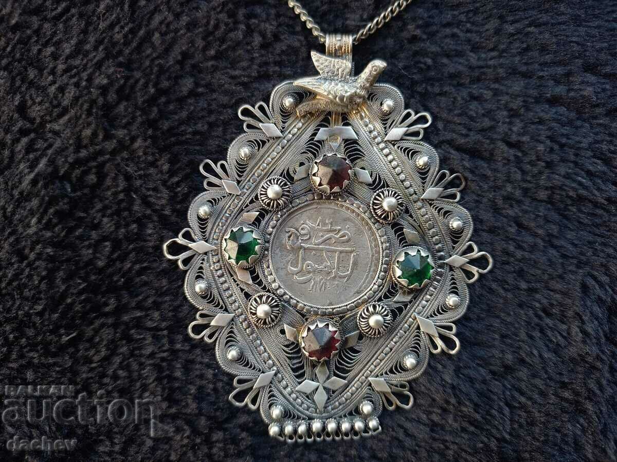 Auction  Renaissance silver filigree medallion with bird ornament costume
