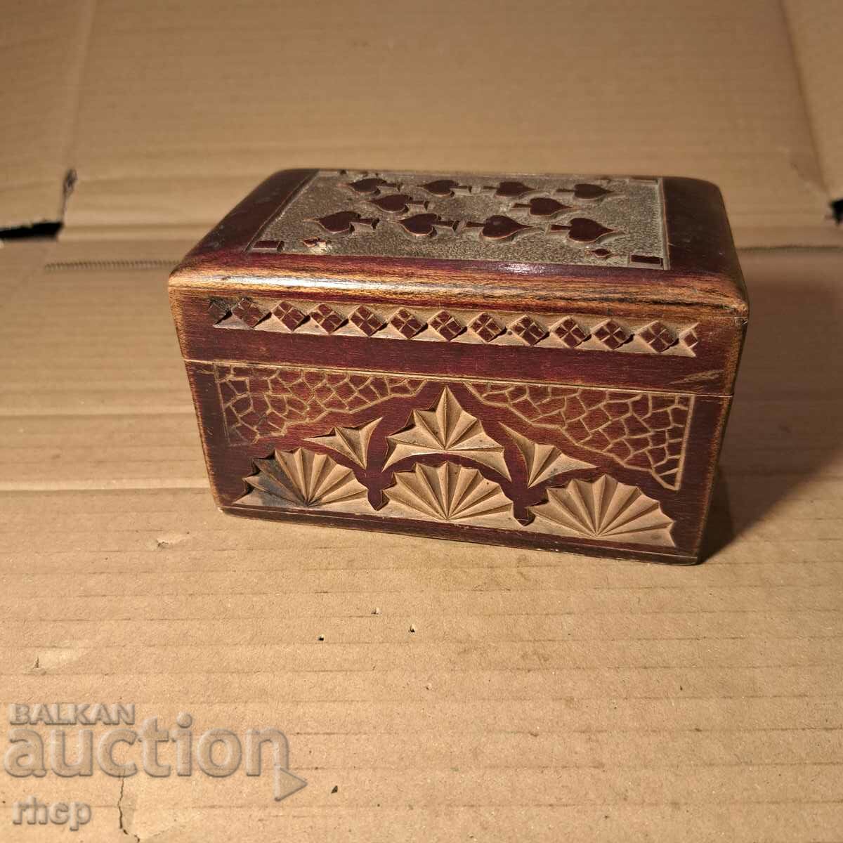 Old carved wood card box