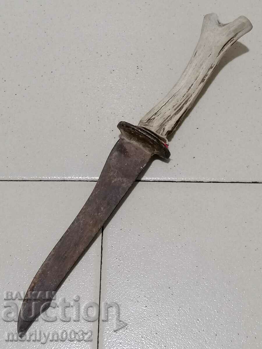 Old knife with antler hilt and blade