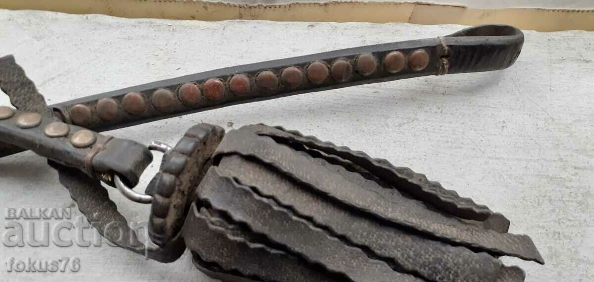 Delivery of Old leather whip, tassel, horse ornament