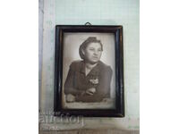 Photo of a woman in a frame old