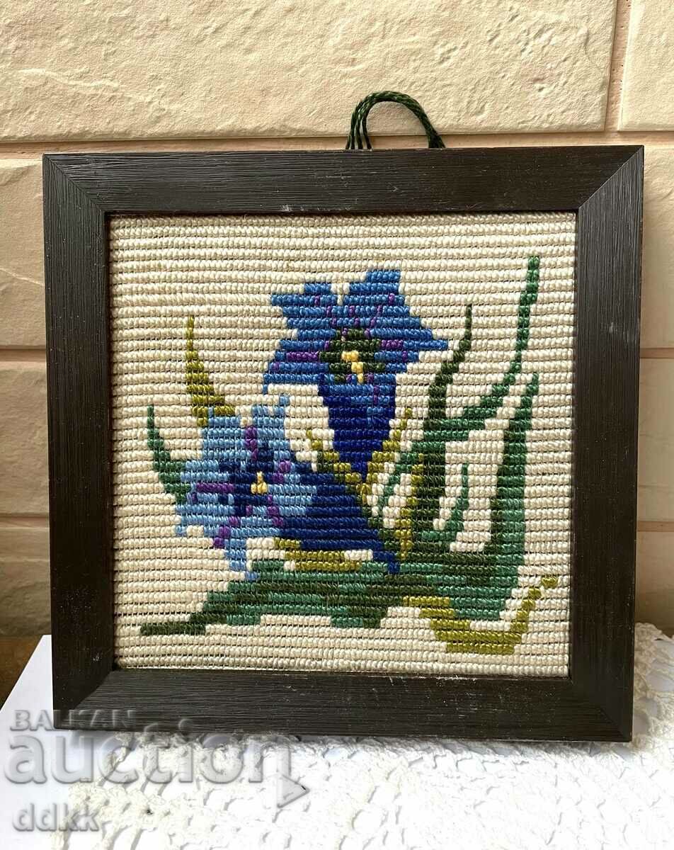 A beautiful little tapestry with violets