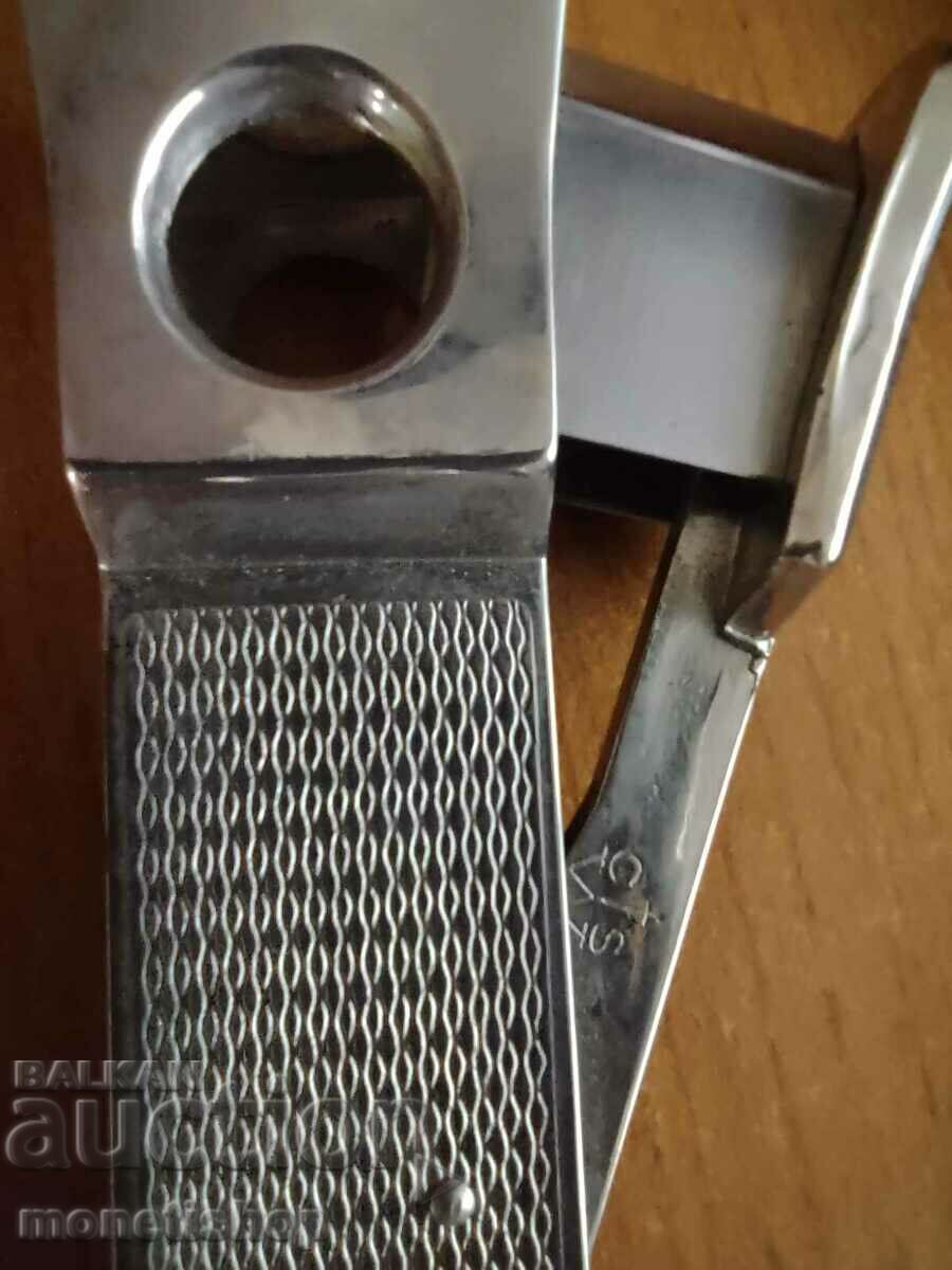 A cigar cutter - 6 A cigar cutter - 6