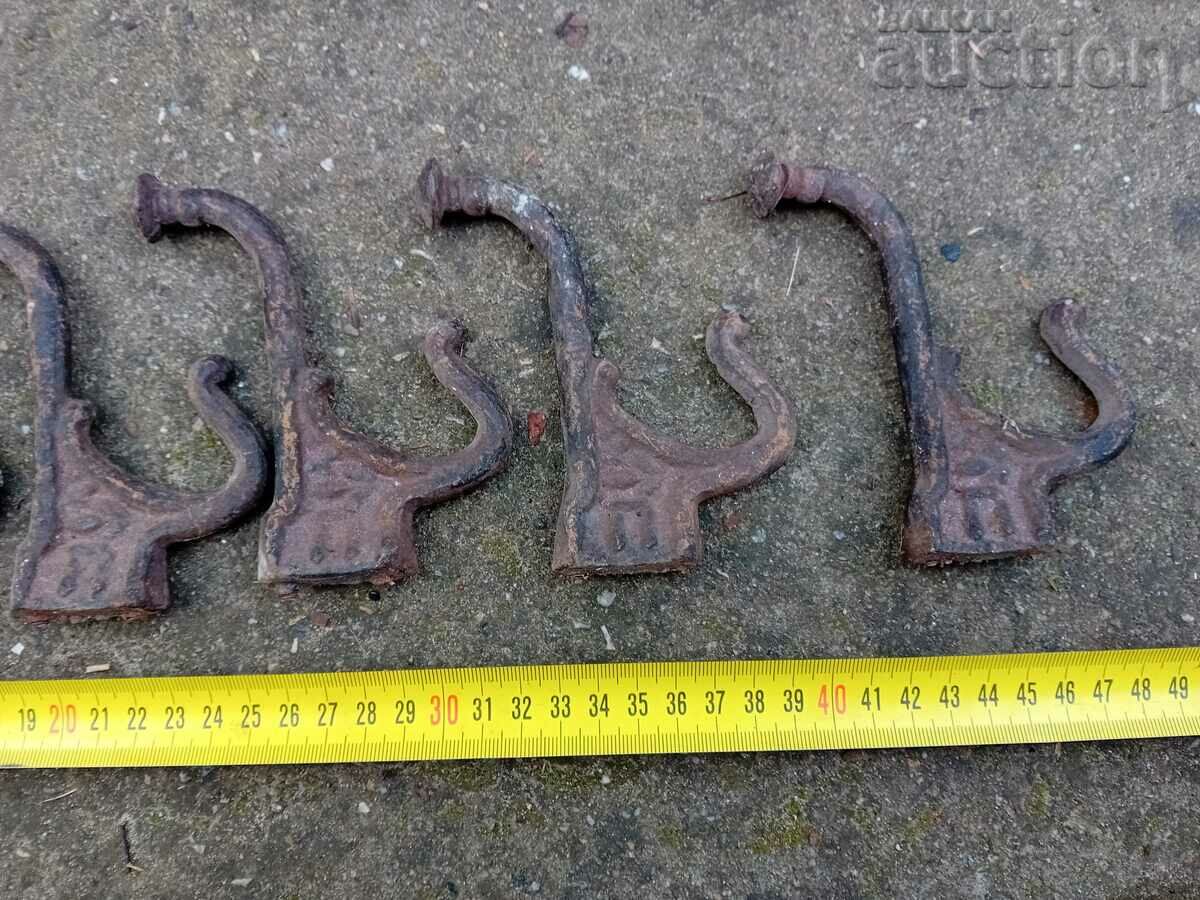 Auction antique cast iron hangers 6 pieces Auction antique cast iron hangers 6 pieces