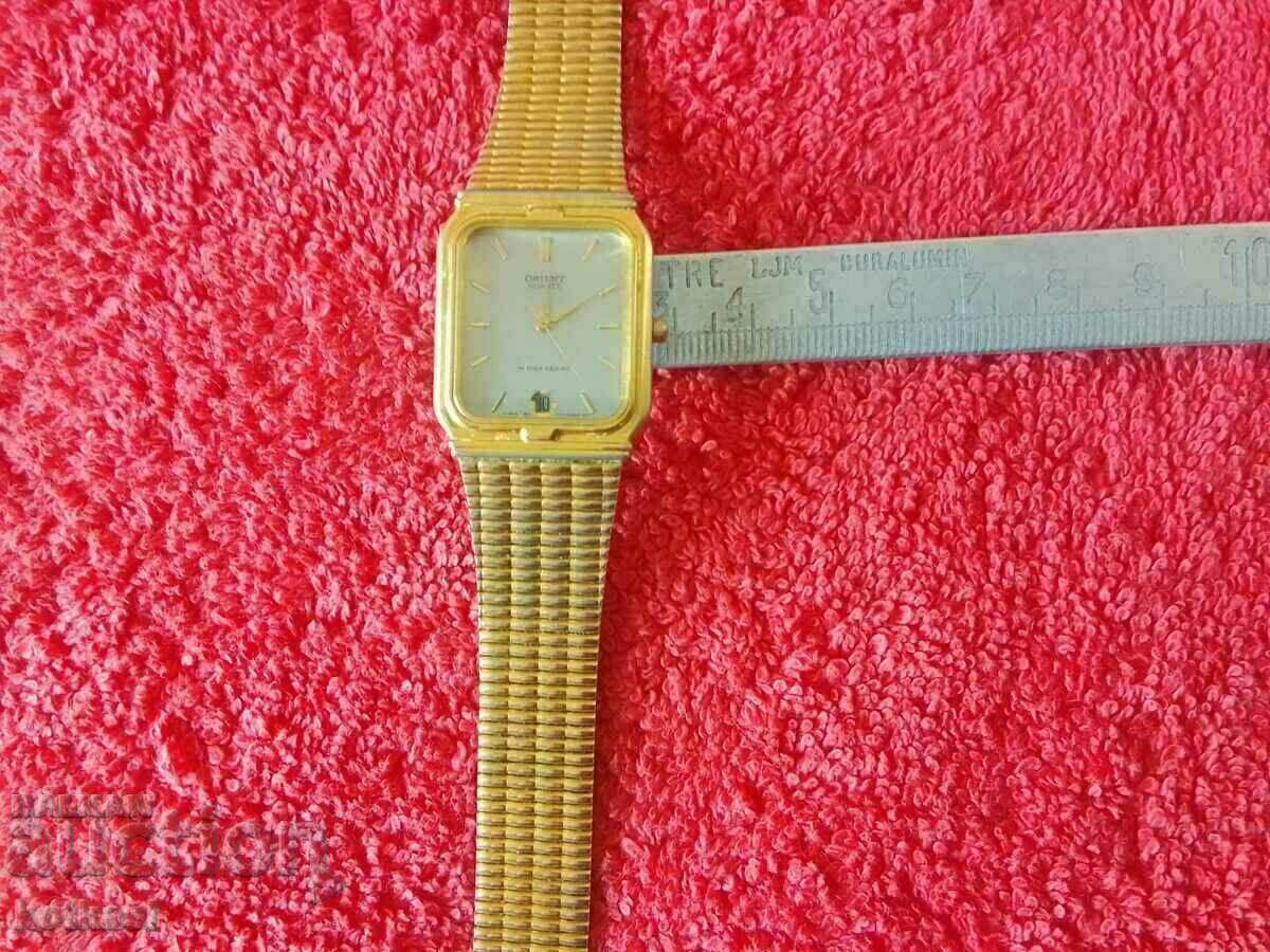 Old manual men's watch ORIENT quartz gilding