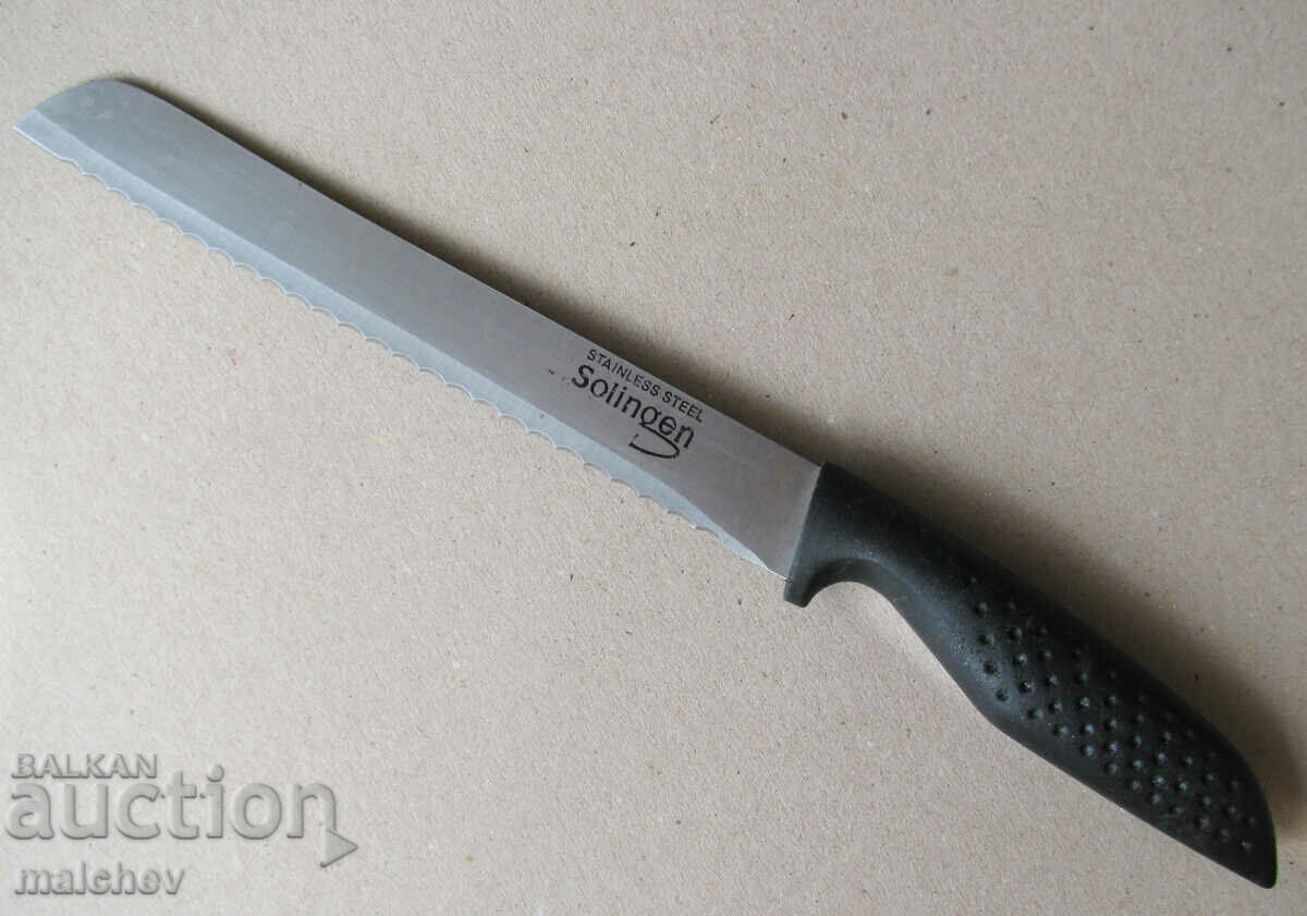 Solingen kitchen knife for bread 33 cm wavy square handle