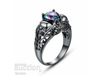 Steampunk ring with rainbow topaz and black rhodium plating