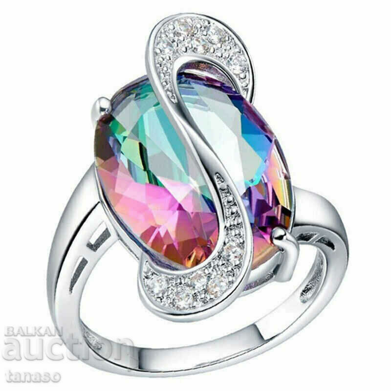 Ring with rainbow topaz and silver plating