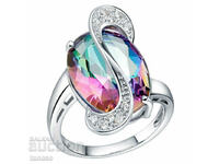 Ring with rainbow topaz and silver plating